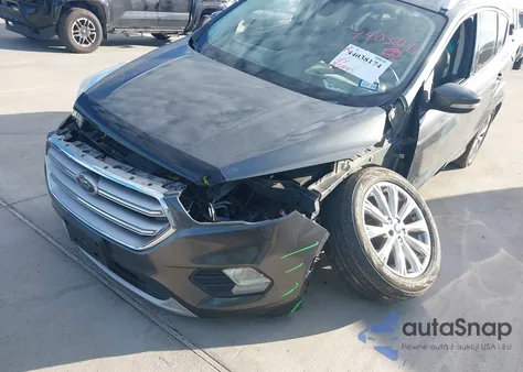 2017 Ford Escape Titanium z USA, uszkodzony, nr VIN 1FMCU0J96HUC13727